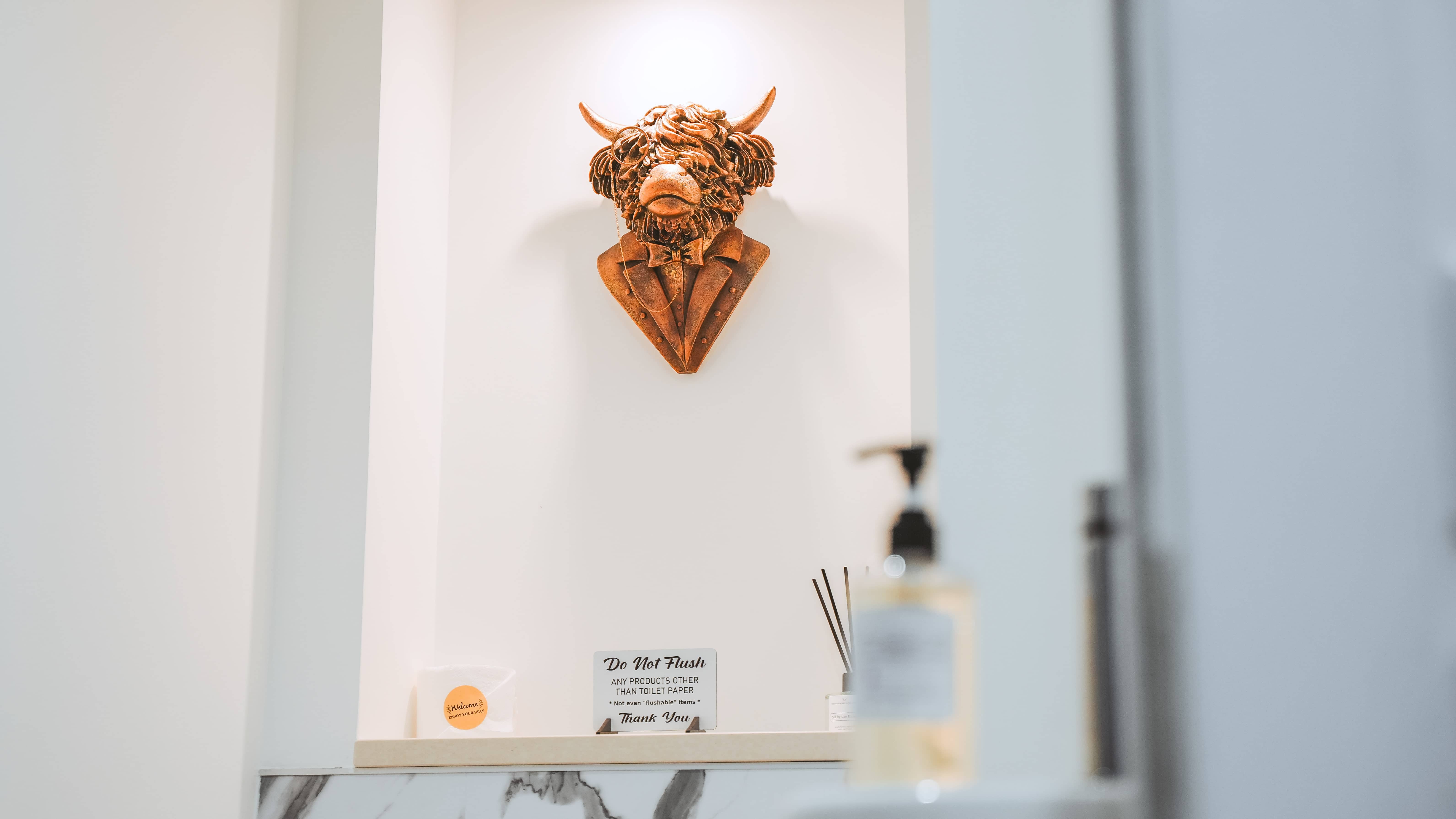 bronze highland cow statue